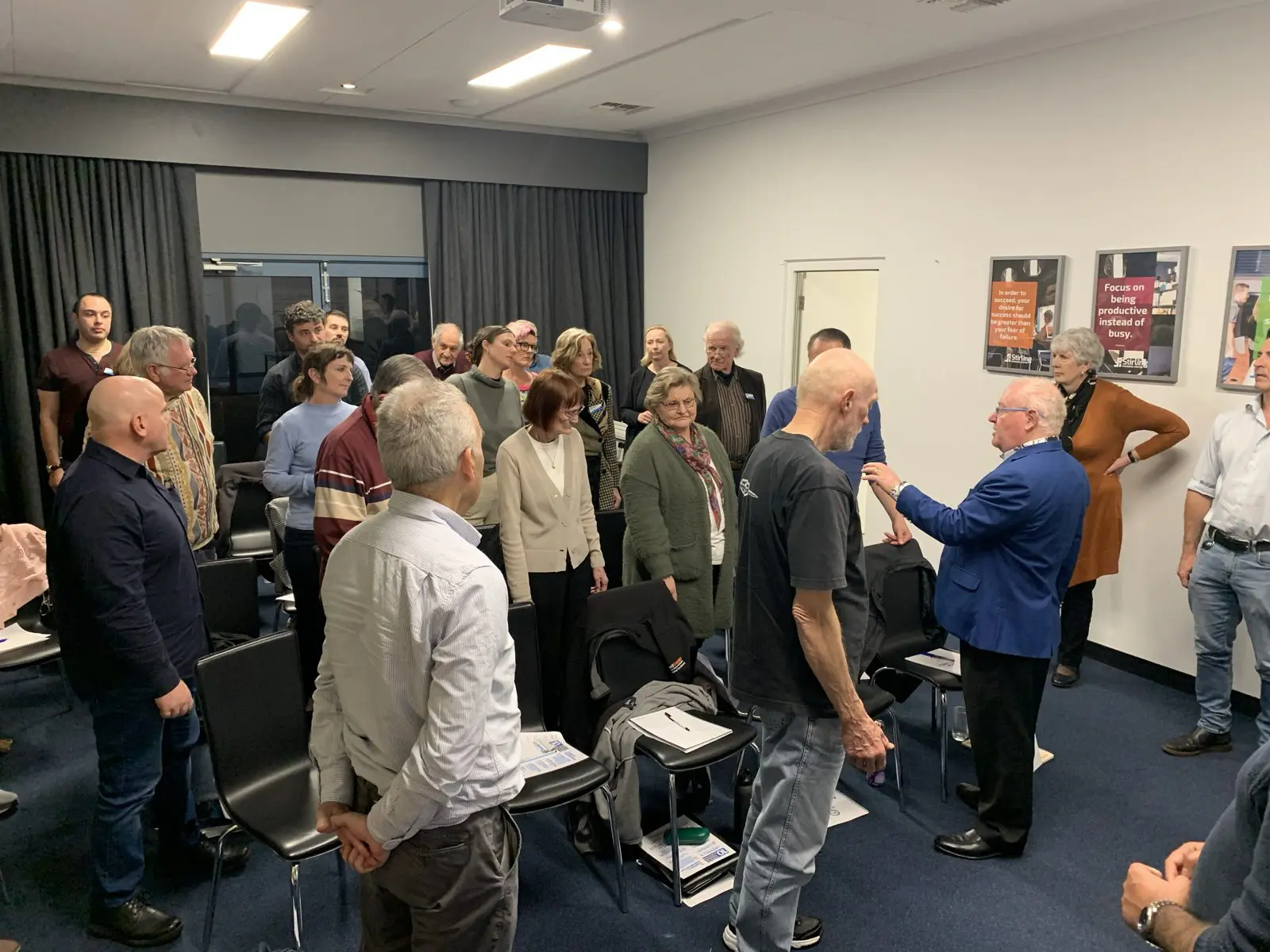 David Julian Price coaching a group to get their message across in Perth
