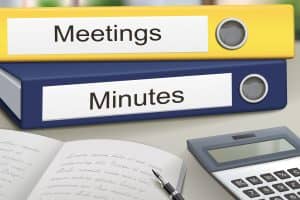 Meetings And Minutes Binders meetings and minutes binders isolated on the office table