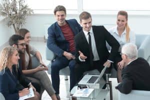 business partners negotiate in the presence of a business team. business partners negotiate in the presence of a business team.